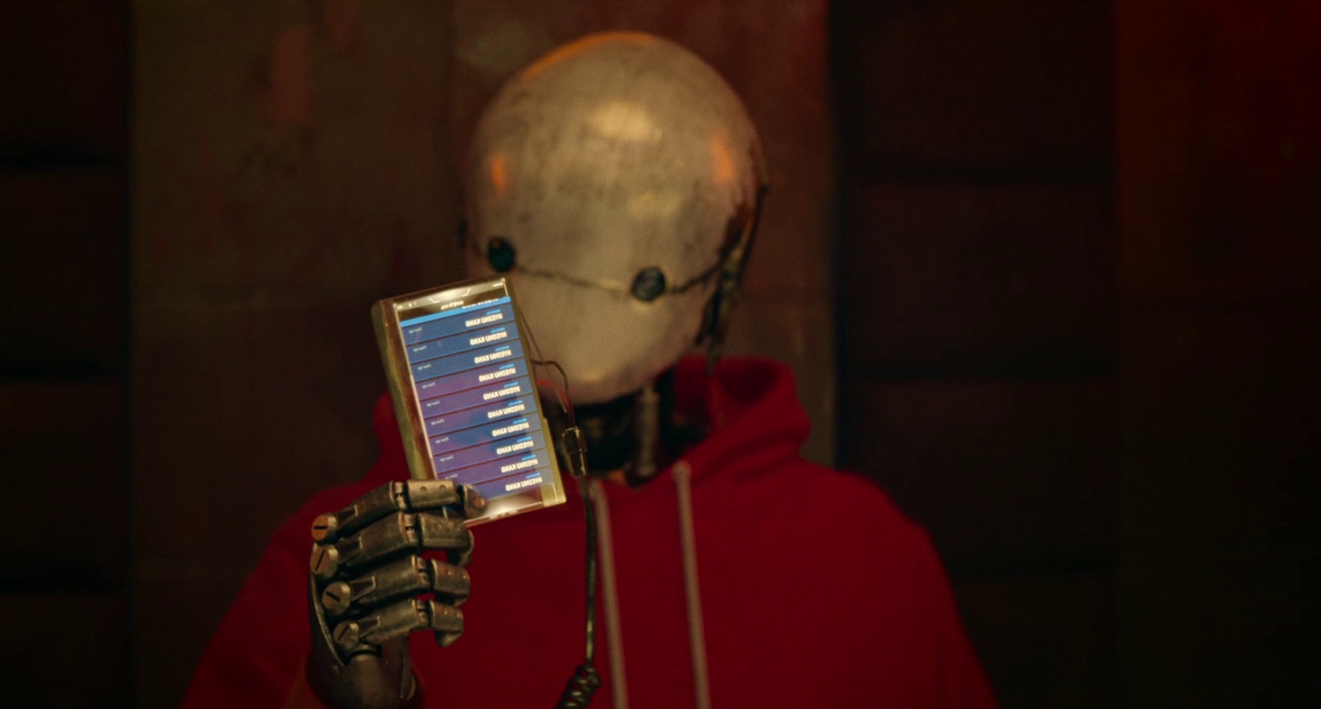 Photo of a robot staring at music tracks on his futuristic ipod